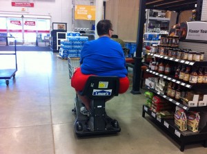 Obese_Man_in_Motorized_Cart_at_Lowe's